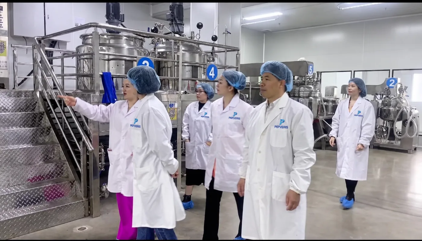 Team walking through the production area